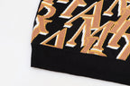 AMIRI Repeat intarsia-knit polo shirt